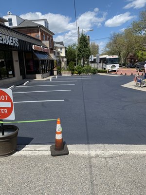 Parking lot sealcoating