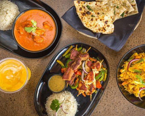 Curries, Kabobs, Biryanis, Garlic Naan & Mango Lassi from Tarka Indian Kitchen!