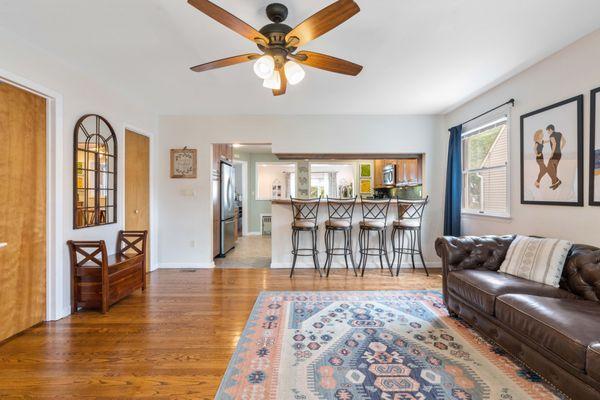 "A living room that combines style and comfort. Our photos highlight every aspect of this inviting space