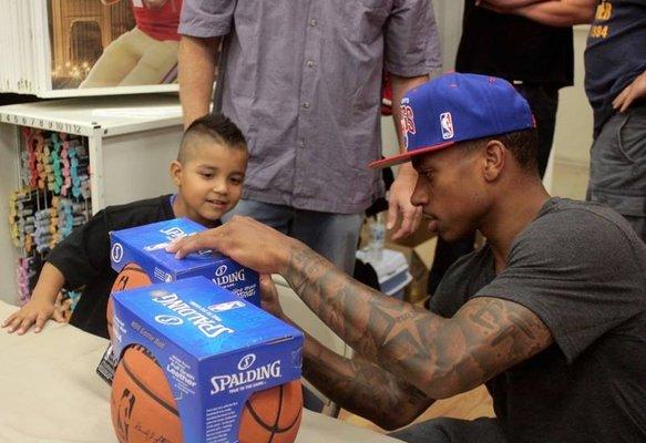 Isaiah Thomas signing at Sports Fever