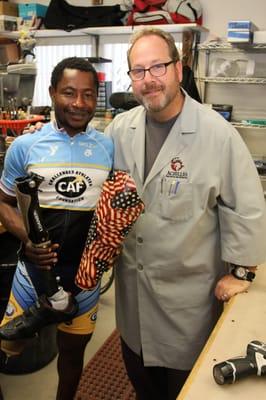 Don fixing ESPY winner Emmanuel Ofosua Yeboah's broken prosthesis. Check out "Emmanuel's Dream" documentary on Amazon narrated by Oprah.