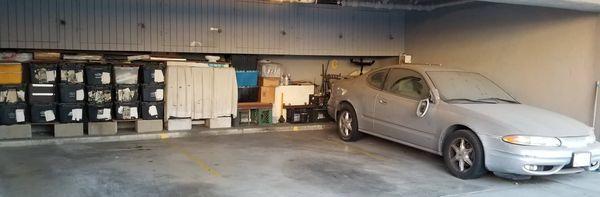 More junk and junk cars belong to apt mgr parked in tenants stolen storage and parking space