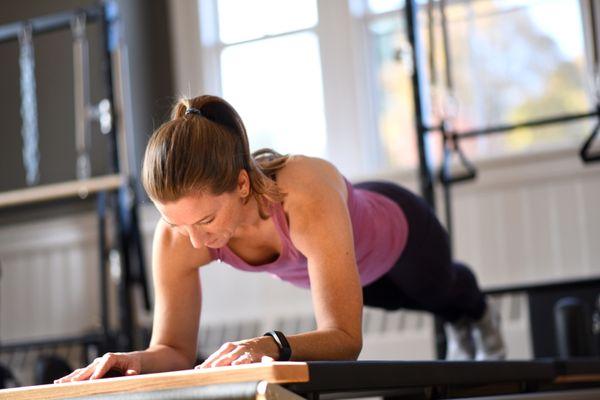 Challenge your core in Pilates Reformer classes on brand new Stott equipment.