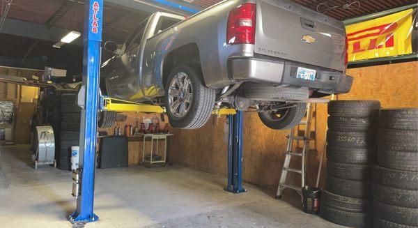 We have a car lift to help us do a bit more of work inside of the shop