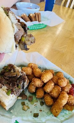 Philly cheesesteak w/seasoned tater tots and tomato soup w/grilled cheese sandwiches on Texas toast.