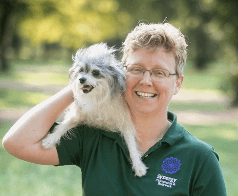 Dr. Sue and her canine welcome wagon Peanut! (Notice the similar hairstyles.)