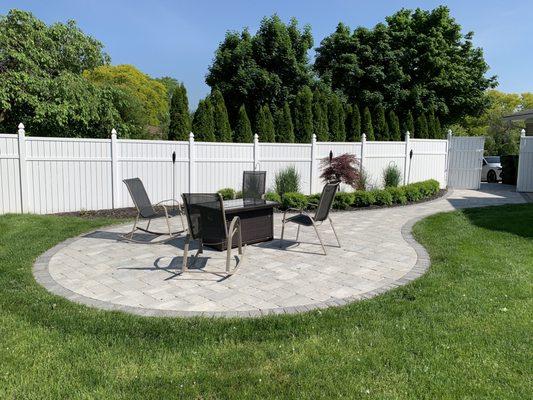 Brick paver patio for fire pit.