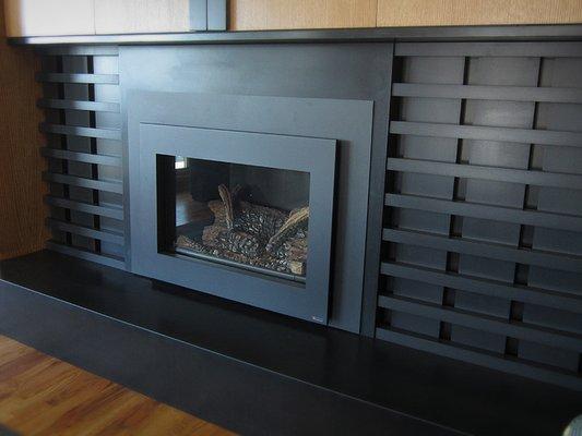 This custom fireplace surround and hearth were built with decorating in mind!