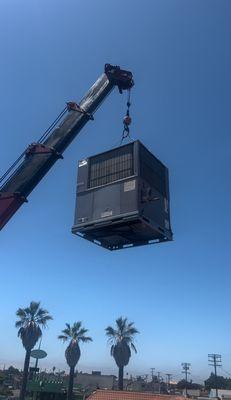 Crane lifting HVAC packing unit of 5tons to be installed.