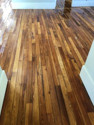 Heart Pine plank flooring, refinished by Dan's Floor Store of Ponte Vedra, Florida - 904.887.8303.