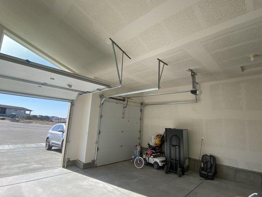 Garage drywall completed and smoothed out for painting .