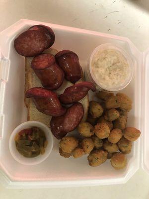 Smoked sausage, fried okra, coleslaw, grilled peppers and onions and toast!