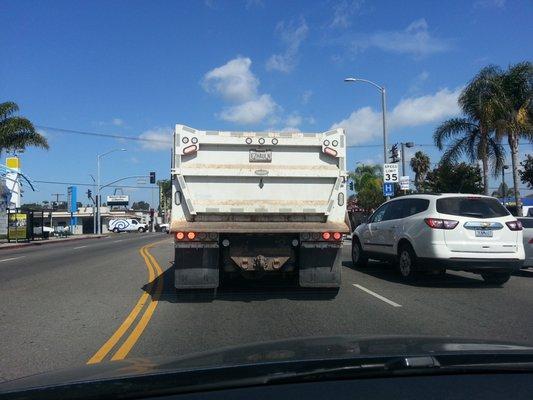 Nice driving behind a truck with a middle finger sign