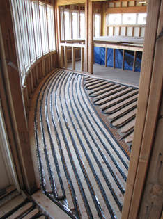 In floor radiant hydronic heating installation