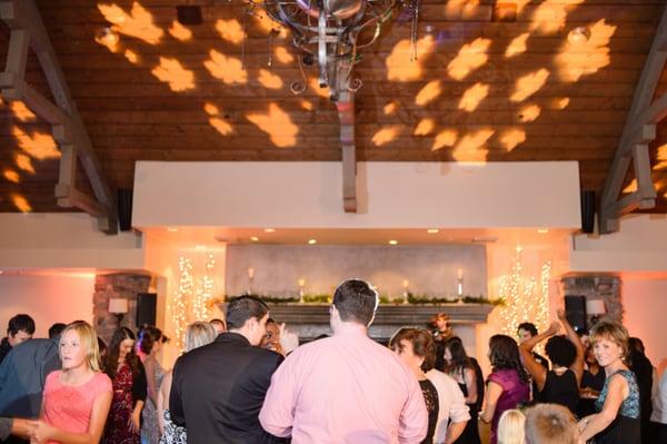 Novermber wedding at Wine & Roses... Beautiful Amber uplights with Fall Leaves projected on the ceiling... Truly Breathtaking....