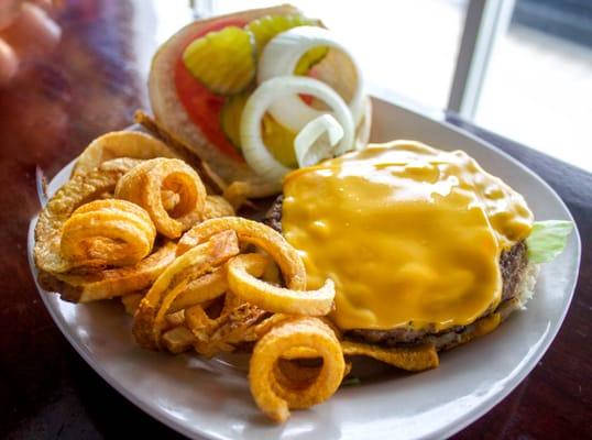 Cooked fresh to order 4oz cheeseburger, with cajun french fries.