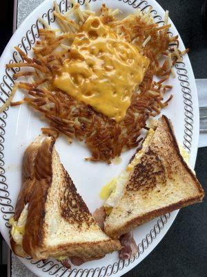 Texas Bacon Egg & Cheese toast with hasbrowns