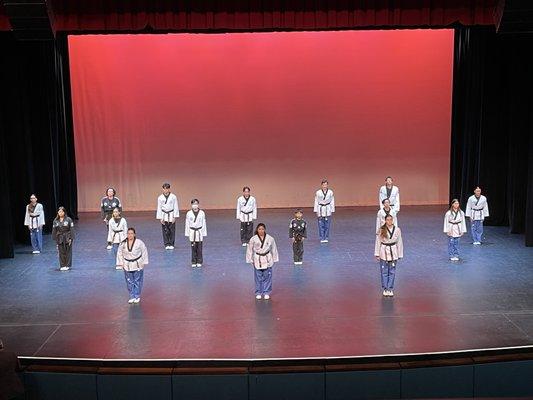 3rd degree black belts doing forms for black belt test.