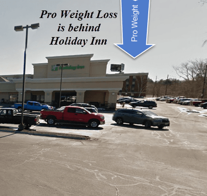 Pro Weight Loss is behind the Holiday Inn. Just come through the Holiday Inn parking lot and you will see our building and parking area.