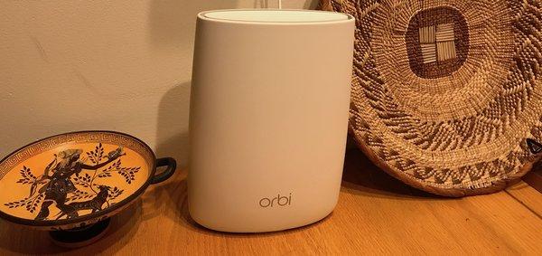 Consumer-grade mesh WiFi: Pictured is the Netgear Orbi WiFi 5 system. We recommend the new AX4200 WiFi 6 version for best performance.