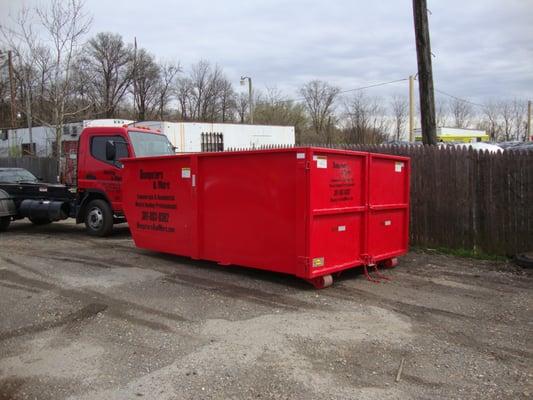 Dumpster with double rear door