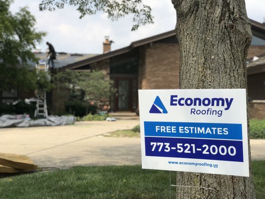 Roof replacement in progress in Burr Ridge, Illinois. Call us today for your free estimate!