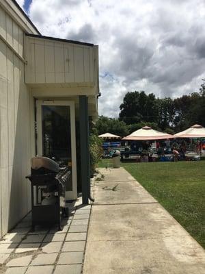 Grill by the hall next to the pool