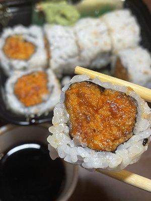 Omg! There's a bug on it!! ...It's a black sesame seed on a spicy tuna roll people :-)~