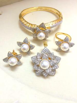 High quality stones with fresh water pearl and gold plating