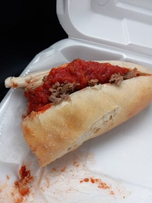 Cheesesteak sandwich with sauce