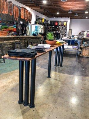 Custom live edge display table for local snowboard / skate shop