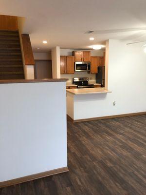 Galley kitchen in townhouse apartments. 
 New appliances, LVP flooring in living area, carpeted upstairs.