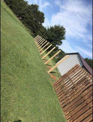 Extending a fence for a customer.