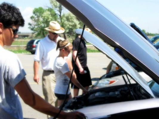 Basic car maintence is so important. Students learn these skills on Defensive Skills Day.