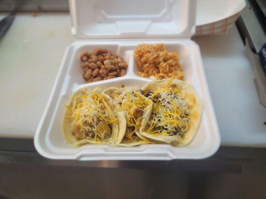 Taco combo ground beef and chicken with rice and beans