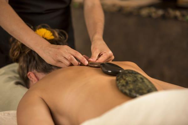 Relaxing therapeutic hot stone massage.