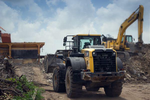 front-loader moving material at the yard