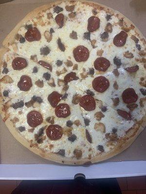 Large meat lovers pizza