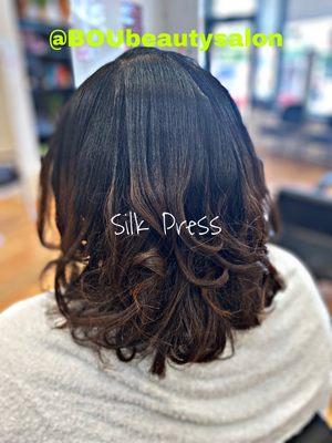 Silk Press on natural curly hair by Hans-Berthe