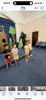 Some of the kids from this years Summer Vacation Bible School singing/dancing in their music class