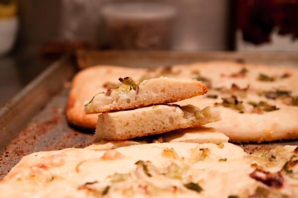 Caramelized leek focaccia. Photo by Toby Sanderson. All rights reserved.