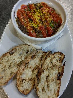 Braised short rib, tomato sauce and yellow grits