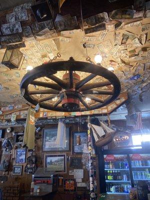 Wagon wheels on the ceiling.