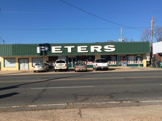 The neon-lit nighttime front exterior of this store can be seen in the film, Mr. Brooks. The scene involves Kevin Costner and Dane Cook.