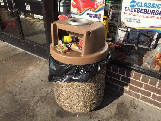 Dirty overfilled garbage cans is usually the norm here