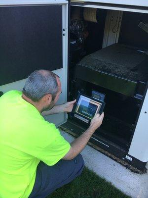 Capturing data during a generator repair service on our proprietary maintenance management software.