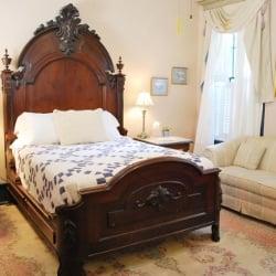 Sarah Brady Guestroom. Antique queen bed, private bath.