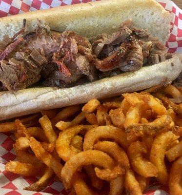 Brisket sandwich and curly fries