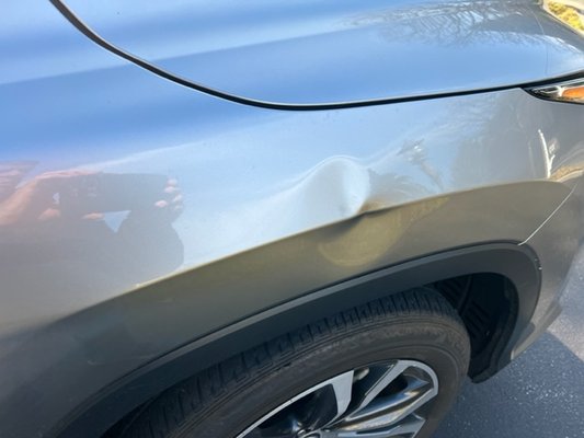 Dented Right Fender on Crease