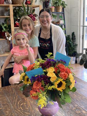 Granddaughters with florist and our flowers